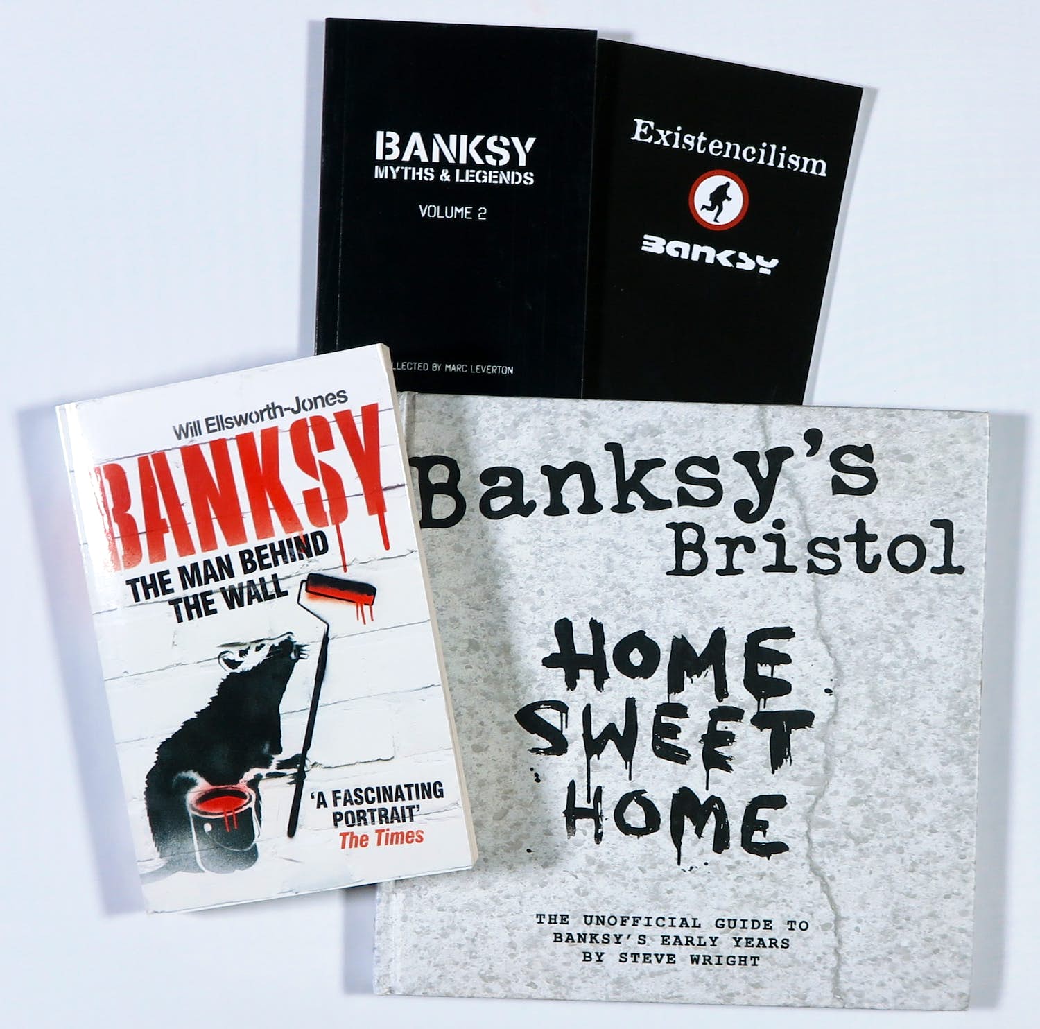Banksy - Lot van vier boeken, Existencilism, The Man behind the Wall en andere kopen? Bied vanaf 80!