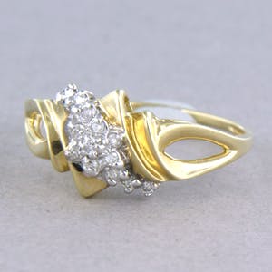 14k bicolor gouden ring bezet met briljant geslepen diamanten tot. 0,13ct kopen? Bied vanaf 1!