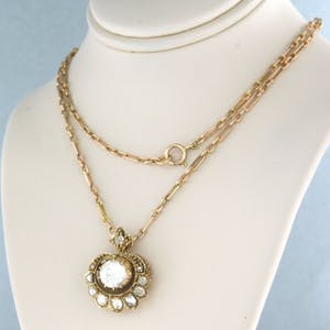 14k rosé gouden collier met hanger bezet met roos geslepen diamant tot. 1,50ct kopen? Bied vanaf 1800!