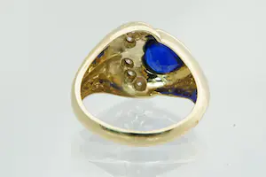 62 - 14 karaat geel gouden ring met blauwe cabuchon geslepen hartvormige steen kopen? Bied vanaf 200!