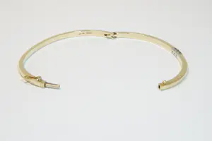 36 - 14 karaats gouden bicolor stijve armband met diamant ca 0.15 crt briljant kopen? Bied vanaf 990!
