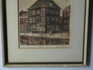 Marius Johannes Janssen - Ingelijste en ingekleurde ets , Zakkendragershuisje Schiedam – ca. 1950 kopen? Bied vanaf 35!