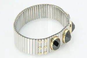 Opvallende staal en 18 krt gouden NOMINATION armband - met 4 grote stenen kopen? Bied vanaf 120!