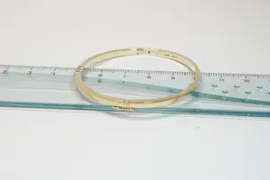 36 - 14 karaats gouden bicolor stijve armband met diamant ca 0.15 crt briljant kopen? Bied vanaf 990!