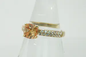 48 - 14 Krt gouden dames ring BLUSH met grote cognac kleurige steen kopen? Bied vanaf 120!