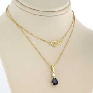14k gouden collier met hanger bezet met saffier en briljant geslepen diamant kopen? Bied vanaf 200!