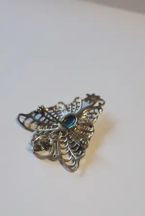 Art Nouveau-sterlingzilveren vlinderbroche en hanger uit  1910. kopen? Bied vanaf 40!