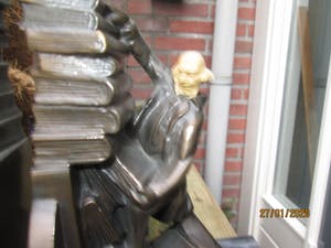 Brons (Onbekend) - Uniek brons boekensteun met aardewerk hoofdje 2 stuks kopen? Bied vanaf 75!