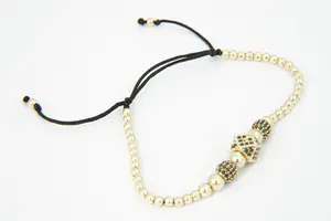24 - Fijn Oosters gedeeltelijk gouden 14krt dames Armband met zwarte steentjes. kopen? Bied vanaf 190!