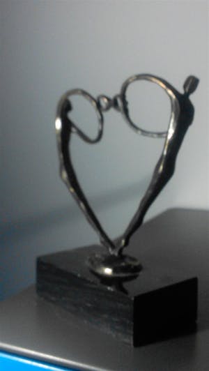 Brons (Onbekend) - twee spelende personen kopen? Bied vanaf 35!