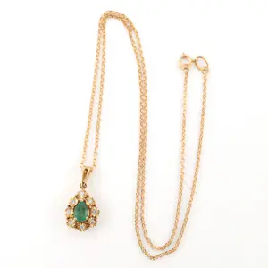14k gouden collier en hanger met smaragd en briljant geslepen diamant tot.0,09ct kopen? Bied vanaf 500!