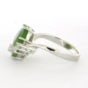 14k wit gouden ring bezet met jade en briljant geslepen diamant tot. 0.10ct kopen? Bied vanaf 350!
