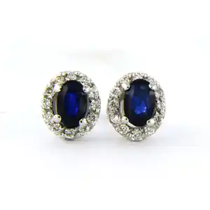 14k gouden oorknoppen bezet met saffier en briljant geslepen diamant tot. 0,12ct verkocht voor € 220!