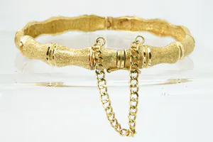 Surinaamse 18 krt geel-gouden zg. "Bamboe" armband - glad/ruw model - kopen? Bied vanaf 640!