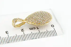 62- Elegante geel-gouden 14 karaats "druppel" hanger - met ca. 0.60ct diamant kopen? Bied vanaf 320!