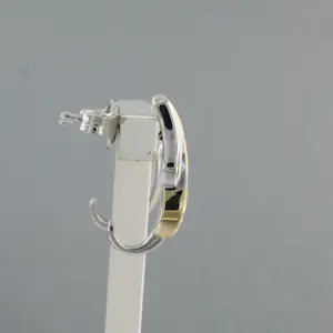 14k bicolour gouden oorknoppen bezet met briljant geslepen diamant tot. 0,20ct kopen? Bied vanaf 410!