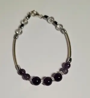 Nieuwe zilveren armband met Amethist edelsteen en bergkristal kopen? Bied vanaf 70!
