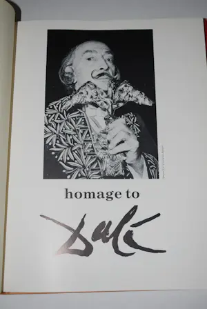 Salvador Dali - 2 hardcovers, waarvan 1 met een kleurenlitho (31x44 cm) kopen? Bied vanaf 150!