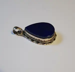 Nieuwe zilveren druppelvormig hanger lapis lazuli bewerkte rand kopen? Bied vanaf 70!