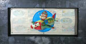 Jan Bollaert - Gemengde techniek op landkaart, Popeye in airplane - Ingelijst (Groot) verkocht voor € 50!