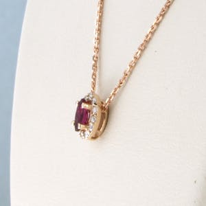 14k gouden collier/hanger met robijn en briljant geslepen diamant tot. 0.10ct kopen? Bied vanaf 200!