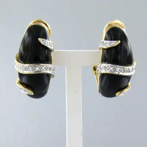 Acheter18k bicolour gouden oorclips met onyx en briljant geslepen diamant tot. 0.20ct? Enchérissez de 1400!