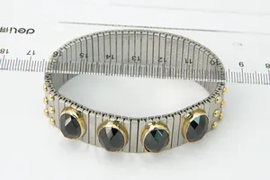 Opvallende staal en 18 krt gouden NOMINATION armband - met 4 grote stenen kopen? Bied vanaf 120!