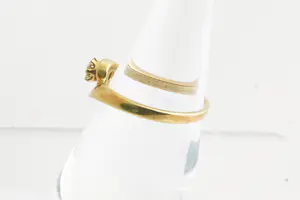 82 - Subtiele 18krt geel-goud & diamanten (0.25ct) gedraaide solitair ring kopen? Bied vanaf 110!