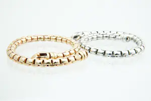 46 - Set van TWEE (2) 14 karaats wit en roségouden armbanden - dubbel geschakeld kopen? Bied vanaf 1170!
