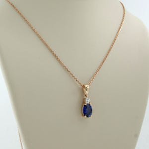 14K Goud - roodgouden hanger met saffier en diamant aan collier kopen? Bied vanaf 185!
