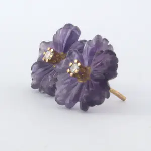 18k rose gouden oorknoppen met amethist en briljant geslepen diamant 0.08 ct kopen? Bied vanaf 185!