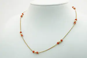 1865 - Sierlijk 18 Krt geel-gouden gourmette collier - met bloedkoraal kaufen? Bieten Sie von 250!