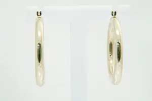 69- Groot en zo goed als nieuw paar 14krt geel-gouden oorringen - Creolen kopen? Bied vanaf 190!