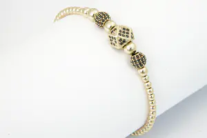 24 - Fijn Oosters gedeeltelijk gouden 14krt dames Armband met zwarte steentjes. kopen? Bied vanaf 190!