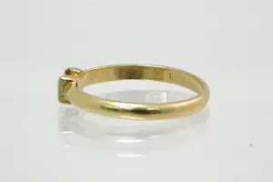69 - Zo goed als nieuwe 18krt gouden solitair ring met 0.15ct (I/si3) diamant kopen? Bied vanaf 190!