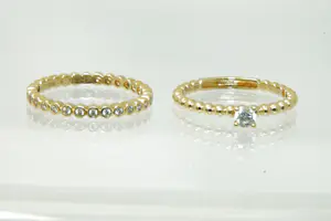 19 - Twee 14 karaats geelgouden Blusch ringen kopen? Bied vanaf 260!