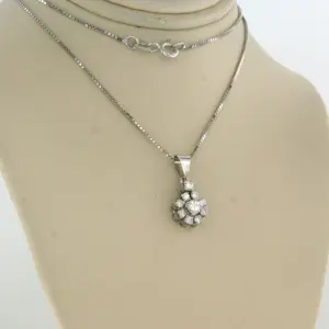 18k wit gouden collier en 14k gouden hanger met briljant geslepen diamant 0.50ct kopen? Bied vanaf 740!