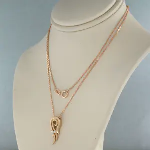 14k gouden collier en hanger met briljant geslepen diamant totaal circa 0.04ct kopen? Bied vanaf 325!