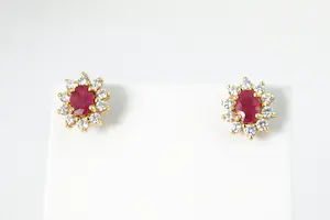 07 -  Paar exclusieve 20 Krt gouden en 1.10ct diamanten oorstekers - kopen? Bied vanaf 980!