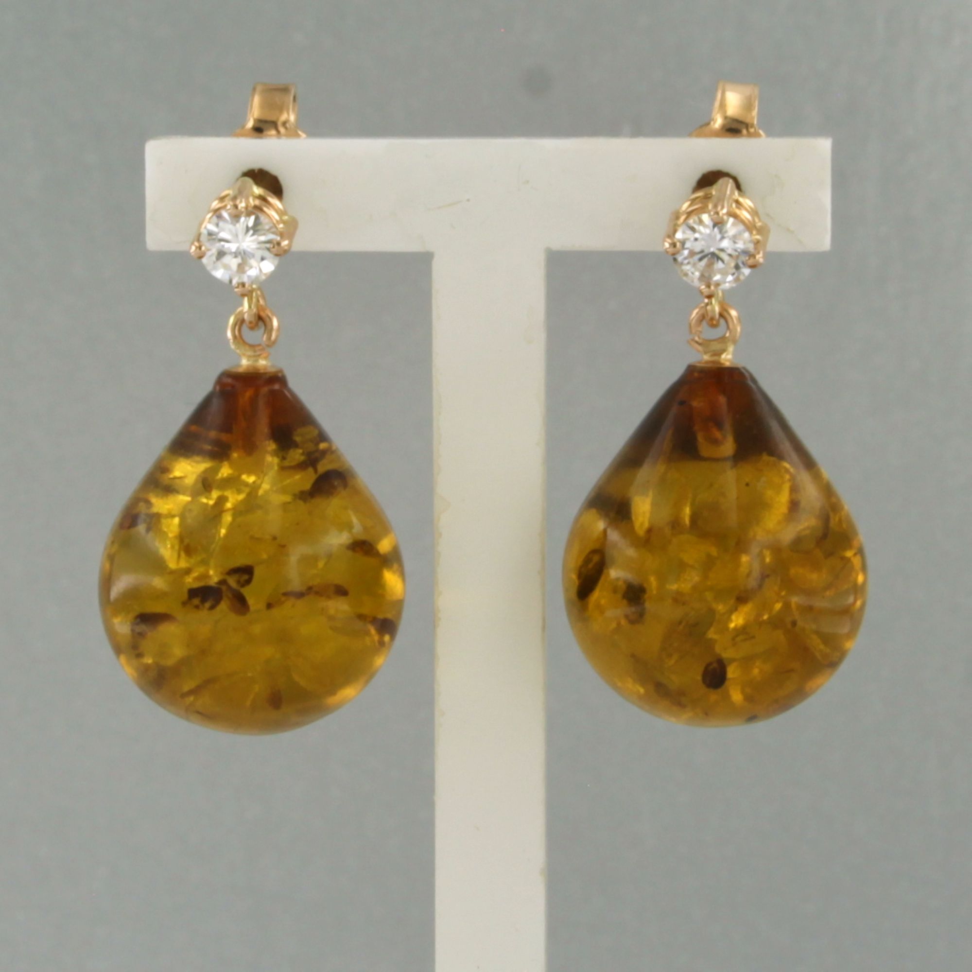 18k gouden oorhangers met barnsteen en briljant geslepen diamant tot. 0.18ct kopen? Bied vanaf 340!