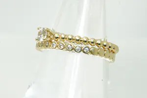 19 - Twee 14 karaats geelgouden Blusch ringen kopen? Bied vanaf 260!