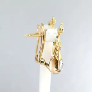 RETRO 18k goud en zilver oorclips in een vorm van vogel met robijn en diamant kopen? Bied vanaf 725!