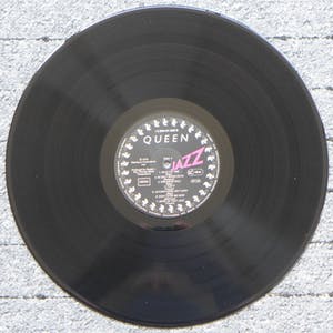 Queen - Jazz, LP Signiert: Mercury, May, Taylor, Deacon, mit Poster kopen? Bied vanaf 350!