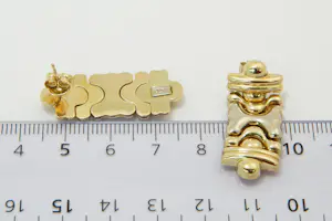 17 - Zo goed als nieuw paar 18krt bicolor gouden -flexibele schakel- oorstekers kopen? Bied vanaf 350!