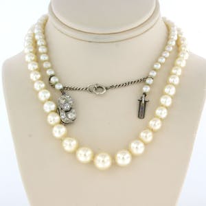 18k gouden art deco slot bezet met oud slijsel diamanten aan een parelcollier kopen? Bied vanaf 400!