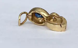 18 kt geelgouden clip hanger met saffier en diamanten kopen? Bied vanaf 380!