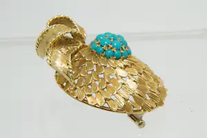52- Vintage fifties 18Krt gouden fantasie broche met strik en turqoise steentjes kopen? Bied vanaf 940!