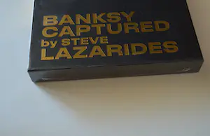 Banksy - en Steve Lazarides; CAPTURED. Black edition. kopen? Bied vanaf 300!