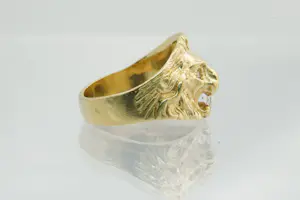 17 - Mooi gedetailleerde 18 Krt geel-gouden Leeuwenkop ring kopen? Bied vanaf 275!