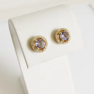 AcheterOorbellen van tanzaniet met een diamanten halo.? Enchérissez de 700!
